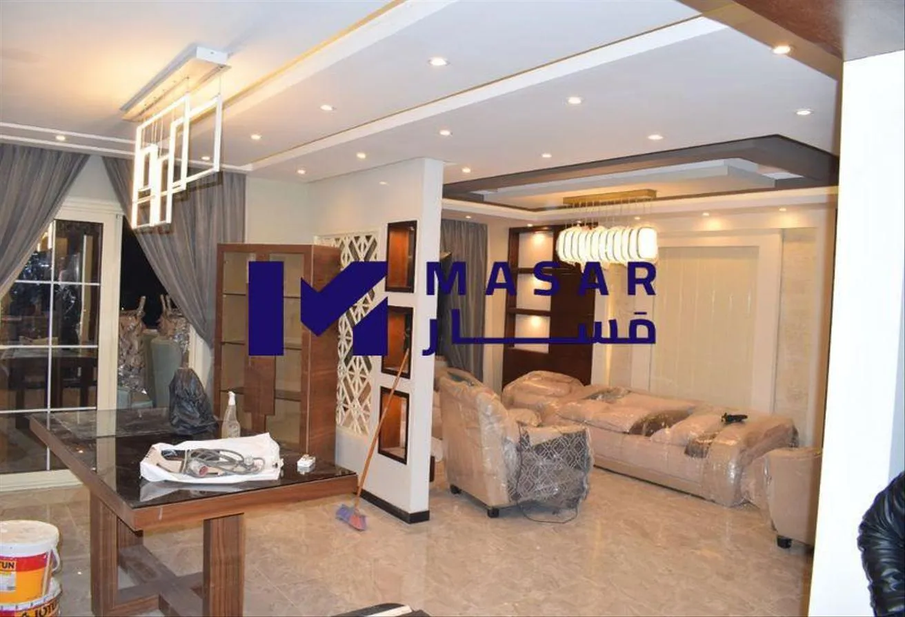 Sale in Ishraqa: Apartment for sale in United Compound, 6th of Octo