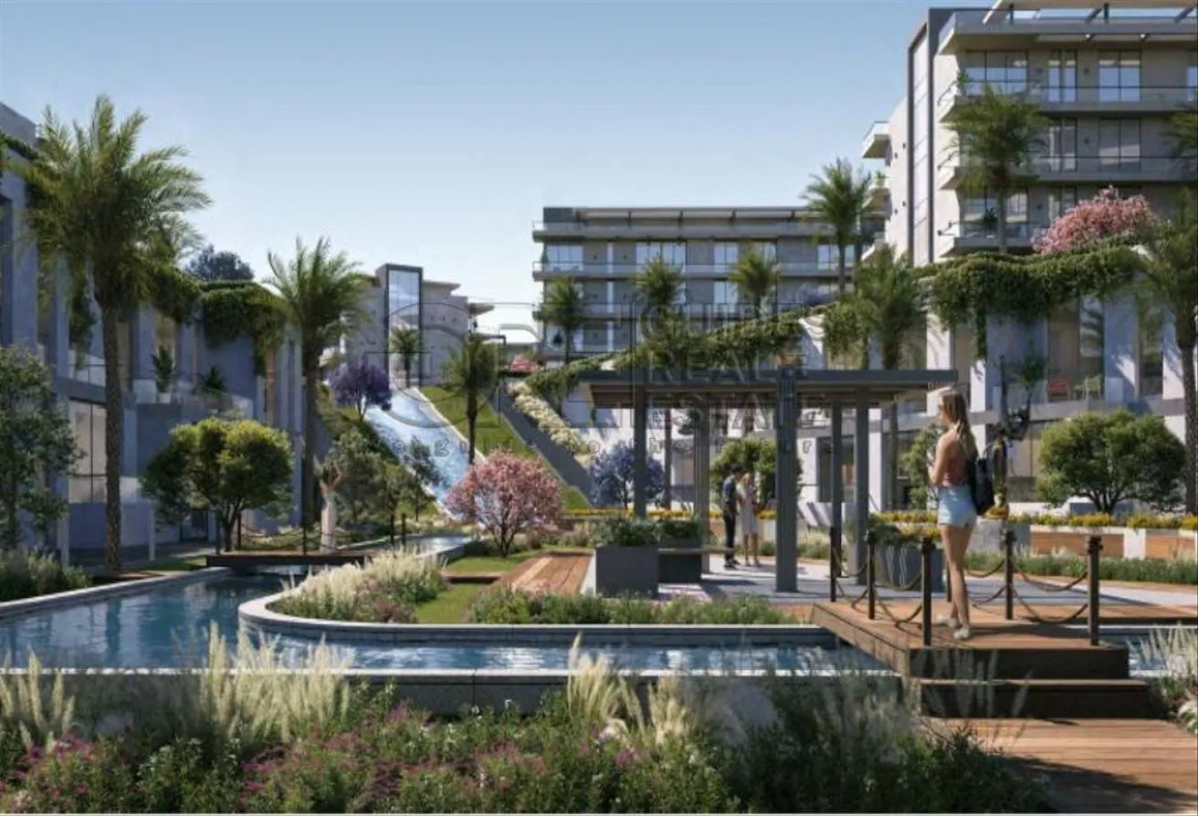 Sale in Al Wahat Road: 80 sqm two-bedroom apartment with installments 8y