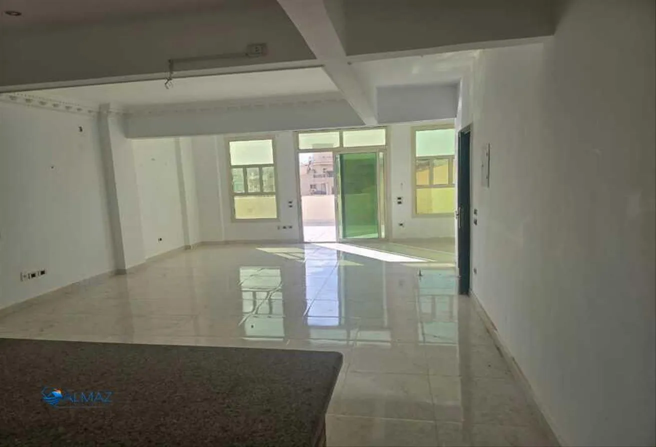Rent in El Banafseg 2: 107m commercial shop for rent semi finish new cair