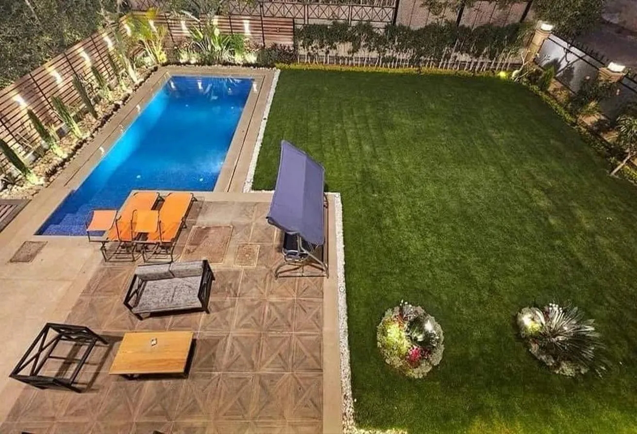 Sale in Refaa Al Tahtawi St.: prime location in Al Rehab,villa with pool 4 sale