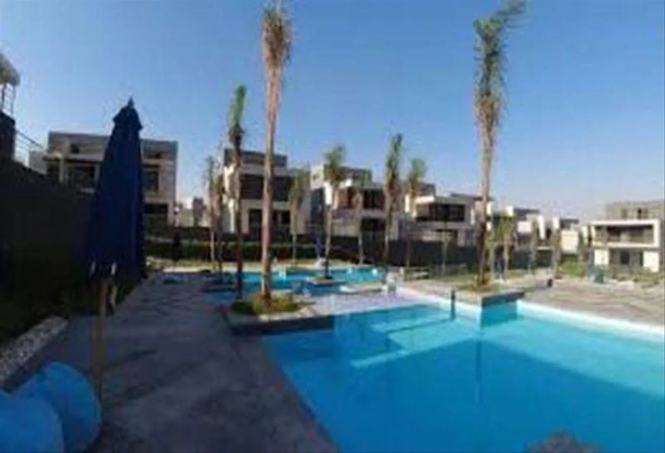 Sale in Patio Al Zahraa: Twin house in Patio Vera in front of Beverly Hills