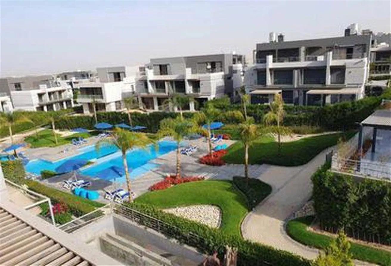 Sale in Patio Al Zahraa: Town villa in Patio Vera in front of Beverly Hills