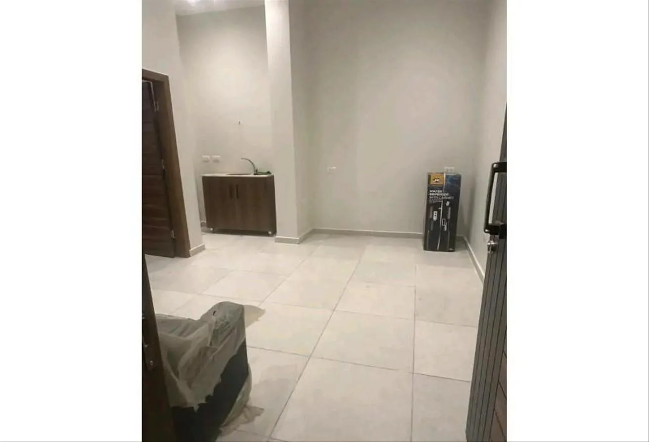 Rent in Al Karma 4: Empty office for rent in Al Karma Mall, Sheikh Zay