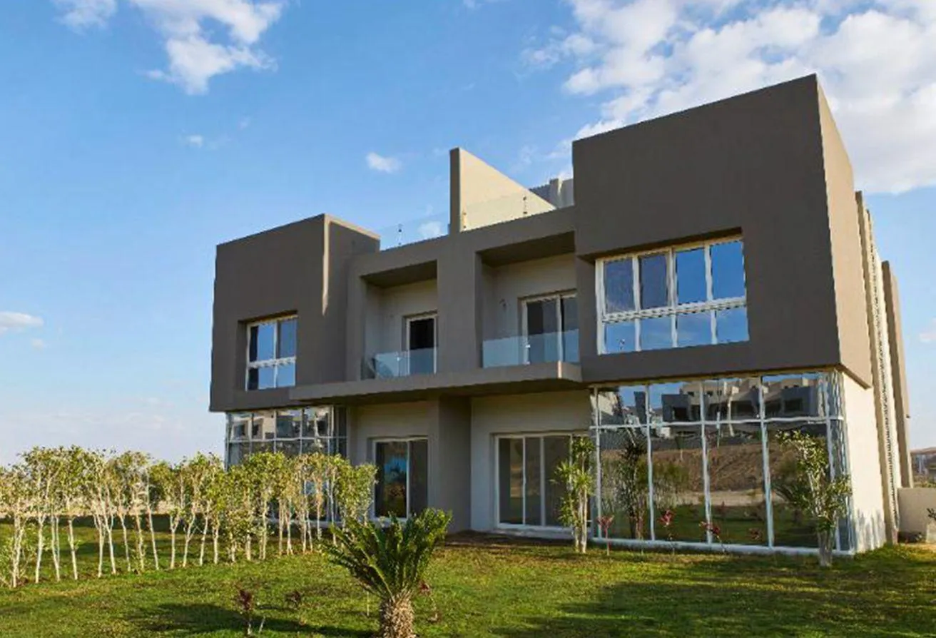 Sale in Etapa: Twin house, ready to move near Al Rabwa - 10 years