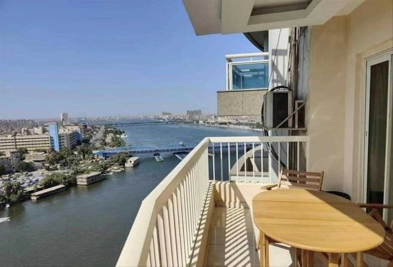 Sale in Cornish El Nile St.: special hotel unit in the Nile Panorama &amp; Pyramids
