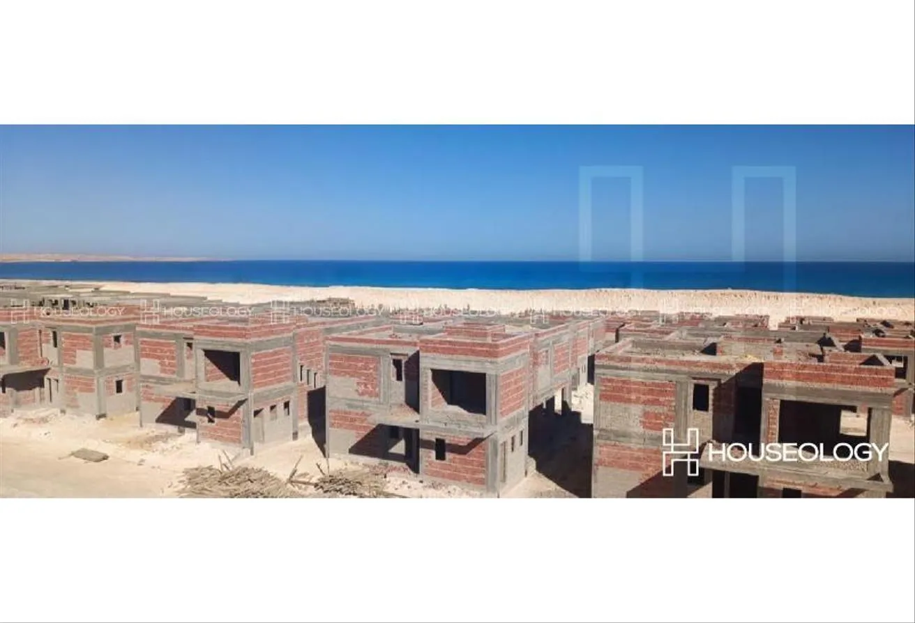 البيع في ازها الساحل الشمالي: ستاندالون للبيع صف اول على اللاجون و ترى البحر 