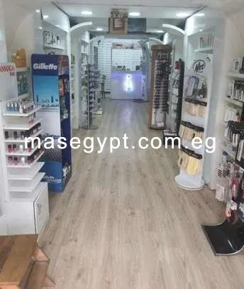 Pharmacy for rent 60m in Mohandessin, Gameat El-Dawwal Street 