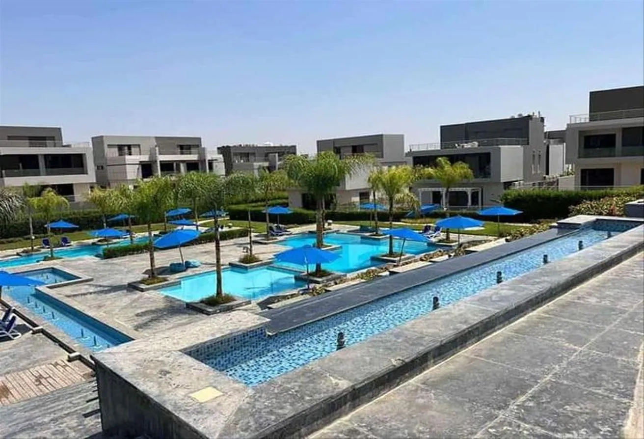 Sale in Patio Al Zahraa: Twin house for sale in Patio Zahraa Compound -