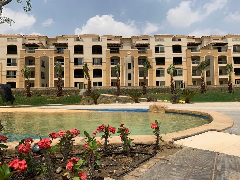 Stone residence Flat with Garden at New Cairo for sale