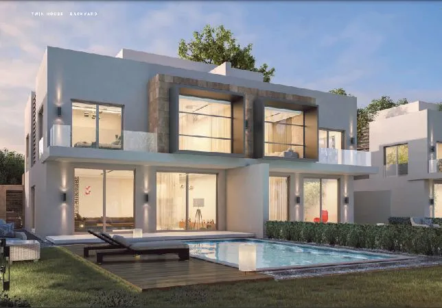 Twin House for sale in Al Karma Gates with installments